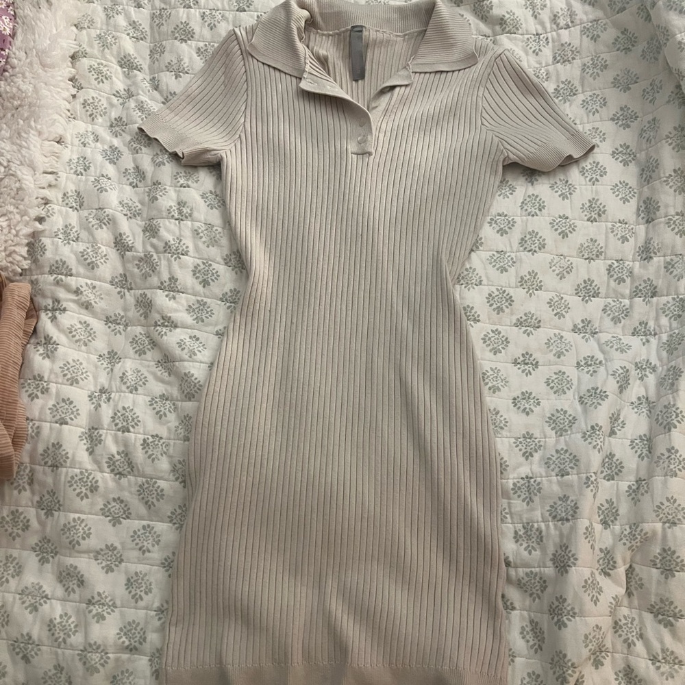Stretchy cream above the knee sporty dress.